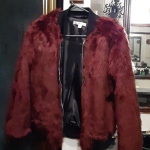 Red/brown furry coat. Make offer
